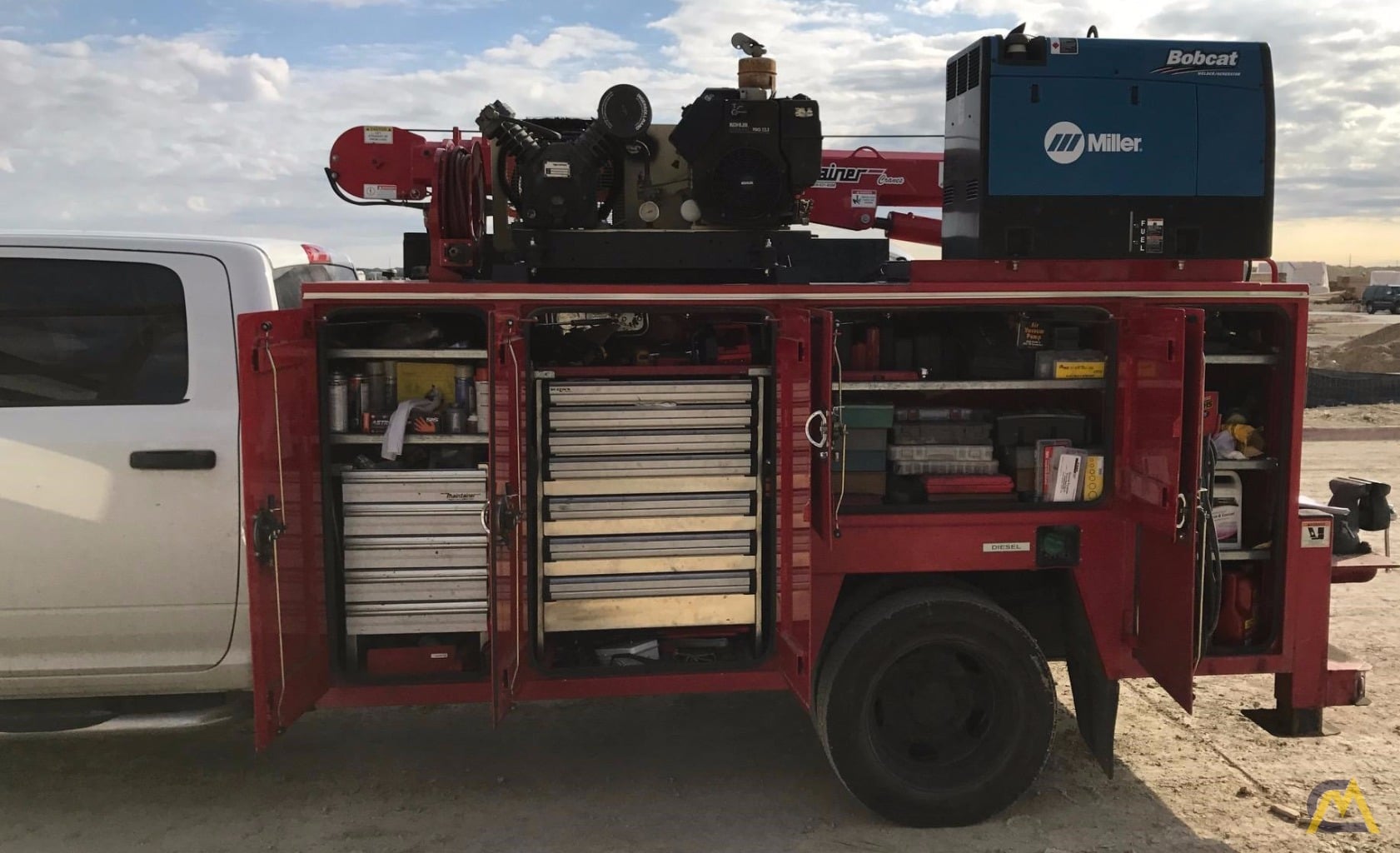 RAM 5500 SLT with Maintainer 6000 Series Service Crane For Sale Hoists