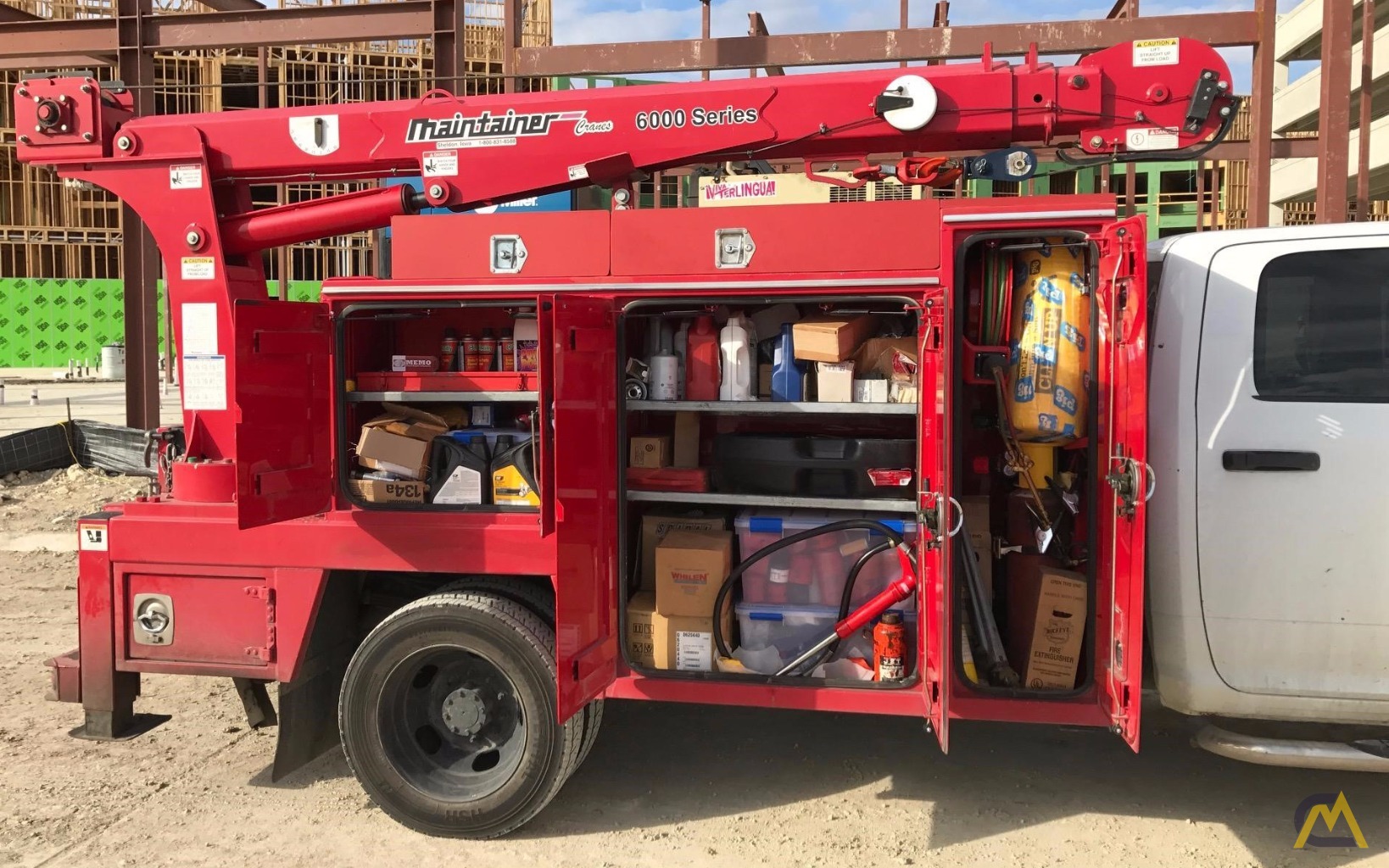 RAM 5500 SLT with Maintainer 6000 Series Service Crane For Sale Hoists